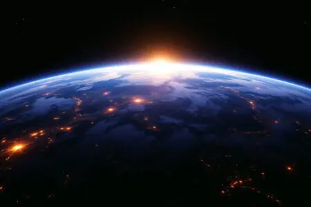 A global image for John 19 Meaning showing a universal light dawning over the Earth from space giving light to everyone