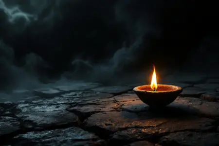 An image representing John 15 Meaning with a single bright lamp burning steadily holding back an immense swirling darkness
